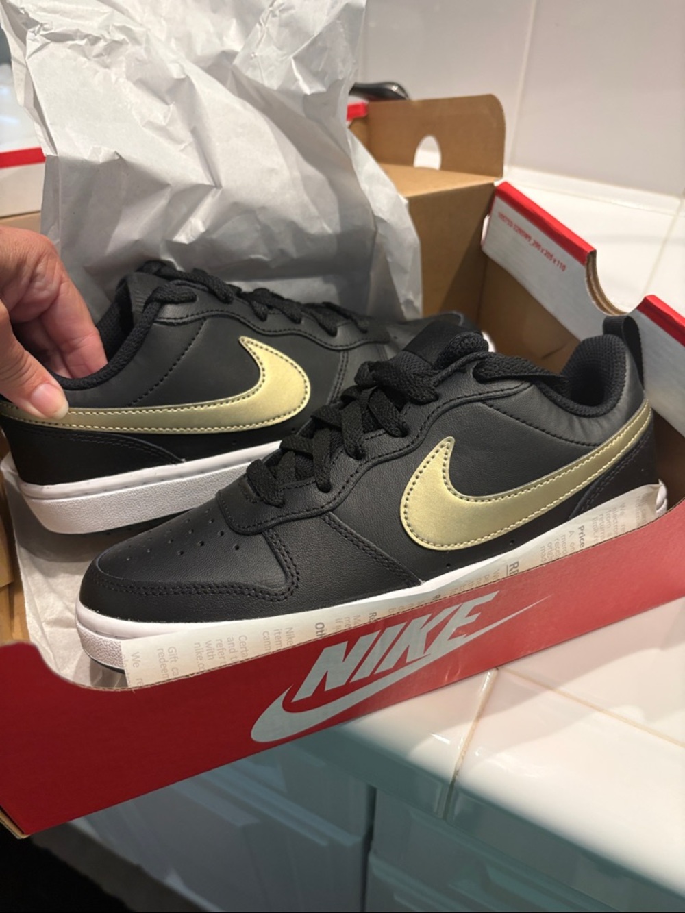Brand new Nike Kids Black Sneakers with Metallic Gold Swoosh